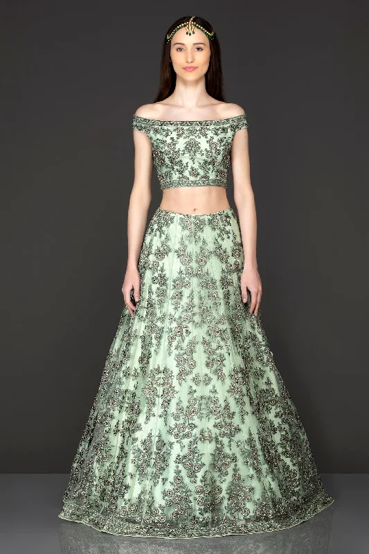 Mint Green Net Lehenga Top With Grey Thread/Resham Embroidery Highlighted With Silver Stones